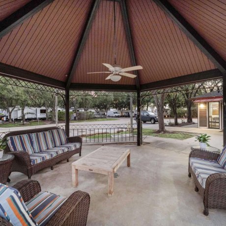Covered outdoor seating area at Allstar RV Resort in Houston, TX