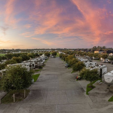 Twilight aerial view of RV pads at Westlake RV Resort in Houston, TX