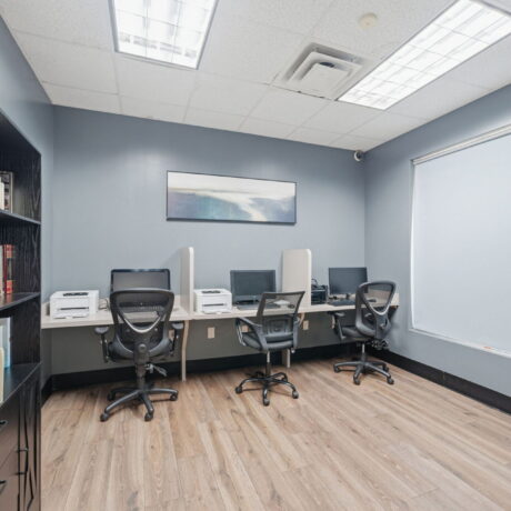 Business center with computer workstations and printers at Mont Belvieu RV Resort — remote work-friendly RV park near Houston Texas