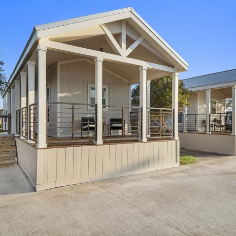 Park model porches with private decks at Mont Belvieu RV Resort — monthly rentals near FM-565 and Baytown refineries