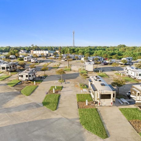 Aerial view of concrete RV pads and utility pedestals at Mont Belvieu RV Resort — monthly sites near FM-565, Baytown TX