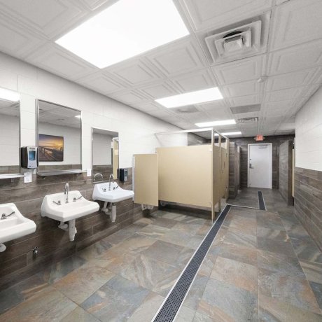 Spacious and modern restroom facilities at Southlake RV Resort with private stalls and vanities